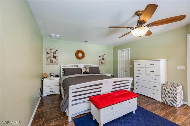 3322 SW 29th Ave, Cape Coral, FL 33914 - bedroom with visible vents, baseboards, and wood tiled floor