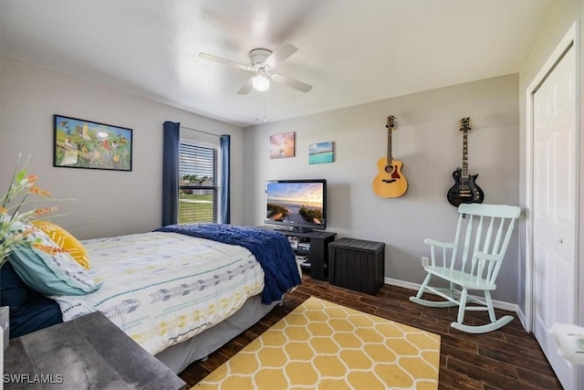 3322 SW 29th Ave, Cape Coral, FL 33914 - bedroom featuring ceiling fan, a closet, baseboards, and wood finished floors