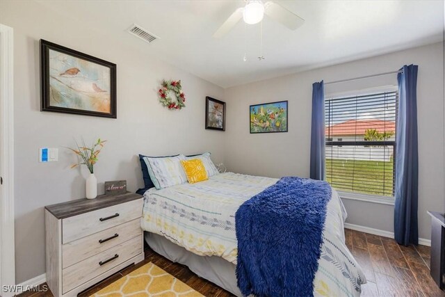 3322 SW 29th Ave, Cape Coral, FL 33914 - bedroom featuring ceiling fan, visible vents, baseboards, and dark wood-style floors