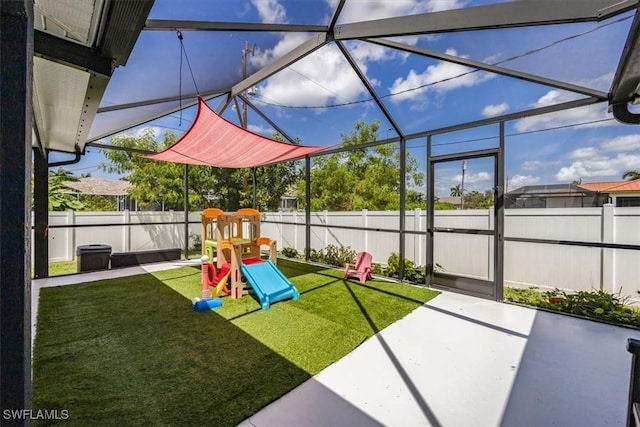 3322 SW 29th Ave, Cape Coral, FL 33914 - exterior space with a yard, a fenced backyard, glass enclosure, and a patio area