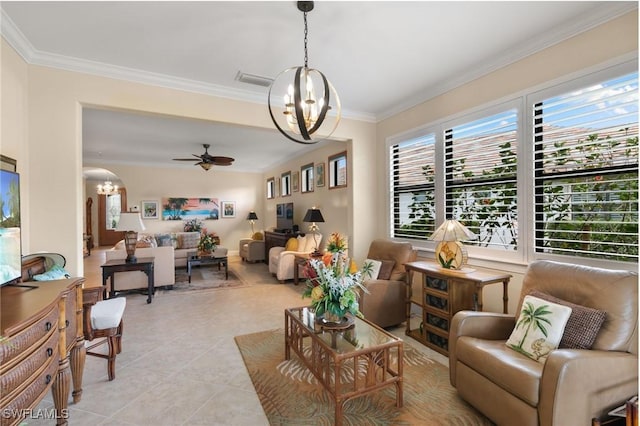 sitting room featuring visible vents, light tile patterned floors, arched walkways, crown molding, and ceiling fan with notable chandelier