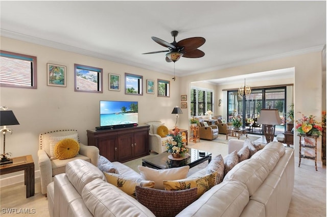 living room featuring ceiling fan with notable chandelier and ornamental molding