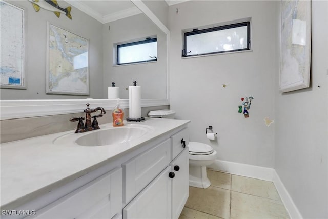 bathroom with tile patterned floors, vanity, baseboards, toilet, and ornamental molding