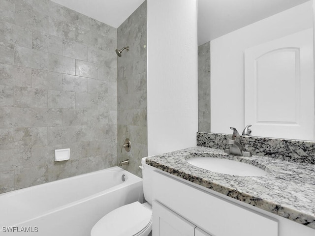 1512 NW 31st Ave, Cape Coral, FL 33993 - bathroom with vanity, washtub / shower combination, and toilet