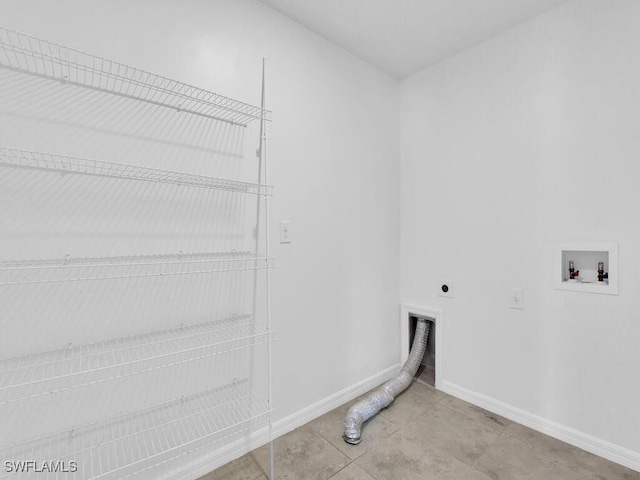 1512 NW 31st Ave, Cape Coral, FL 33993 - laundry area featuring washer hookup, hookup for an electric dryer, laundry area, light tile patterned floors, and baseboards