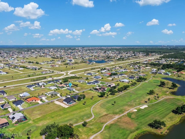 1512 NW 31st Ave, Cape Coral, FL 33993 - bird's eye view featuring a water view, view of golf course, and a residential view