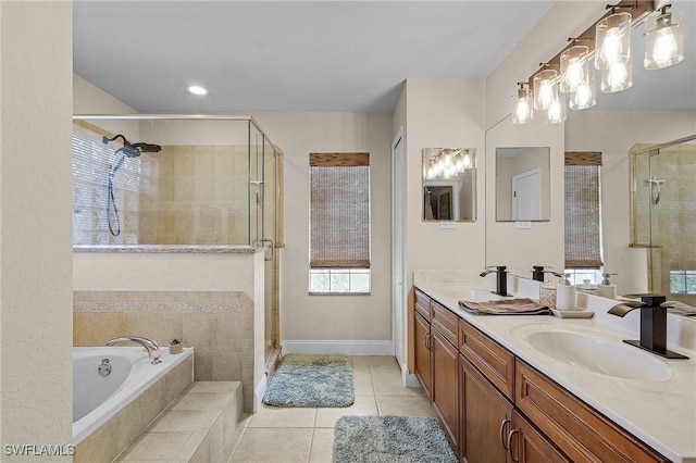 26 NW 29th Pl, Cape Coral, FL 33993 - bathroom with a shower stall, a bath, double vanity, and a sink