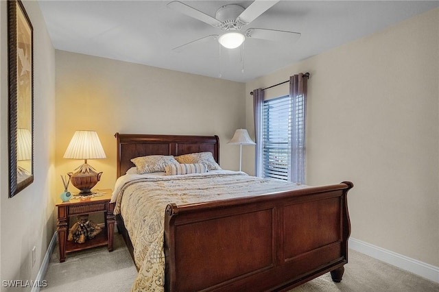 26 NW 29th Pl, Cape Coral, FL 33993 - bedroom featuring light carpet, ceiling fan, and baseboards