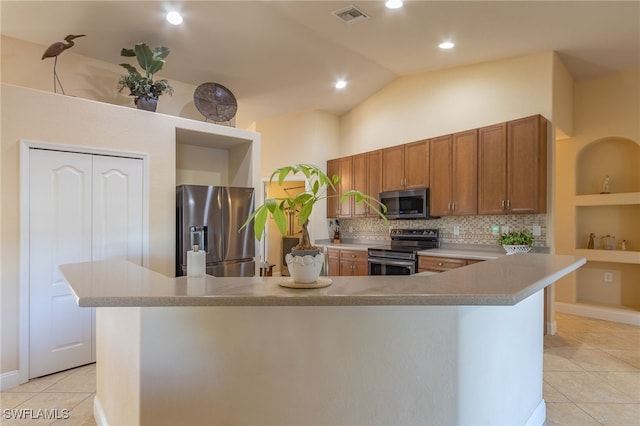 26 NW 29th Pl, Cape Coral, FL 33993 - kitchen featuring light tile patterned flooring, light countertops, visible vents, and stainless steel appliances