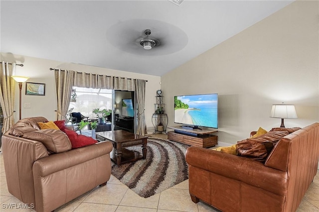 26 NW 29th Pl, Cape Coral, FL 33993 - living area featuring light tile patterned flooring, a ceiling fan, and vaulted ceiling