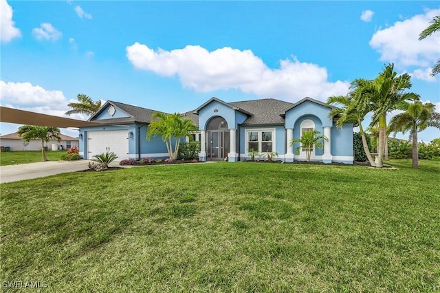 26 NW 29th Pl, Cape Coral, FL 33993 - ranch-style house featuring concrete driveway, a front yard, stucco siding, and a garage