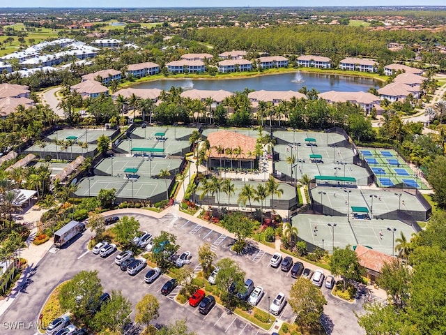 bird's eye view with a water view