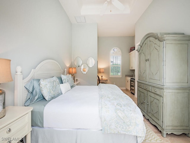 bedroom with ceiling fan and beverage cooler