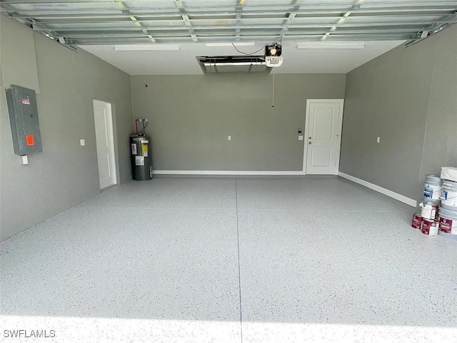 garage with a garage door opener, electric panel, and electric water heater