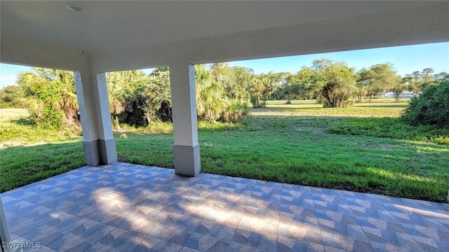 1138 Argosy Rd, Labelle, FL 33935 - view of patio featuring view of wooded area