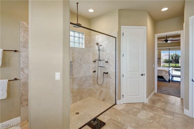 144 SW 54th Ter, Cape Coral, FL 33914 - ensuite bathroom featuring a wealth of natural light, ensuite bathroom, a ceiling fan, and baseboards