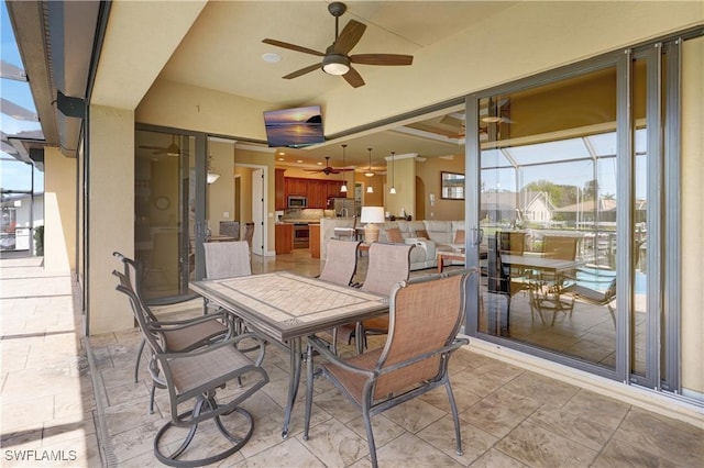 144 SW 54th Ter, Cape Coral, FL 33914 - view of patio / terrace featuring outdoor dining area and ceiling fan