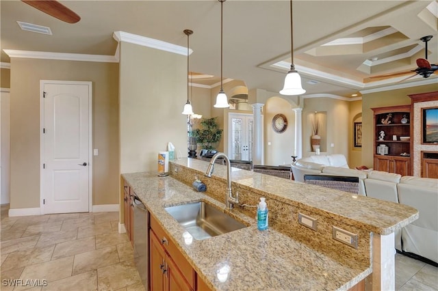 144 SW 54th Ter, Cape Coral, FL 33914 - kitchen with crown molding, decorative columns, a ceiling fan, and a sink
