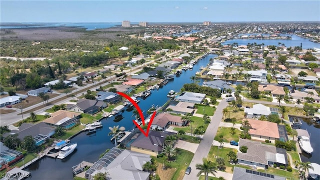 144 SW 54th Ter, Cape Coral, FL 33914 - bird's eye view with a water view and a residential view
