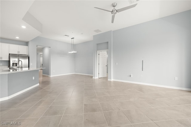 12000 Santaluz Dr Unit 202, Fort Myers, FL 33913 - unfurnished living room featuring light tile patterned flooring, visible vents, baseboards, recessed lighting, and ceiling fan