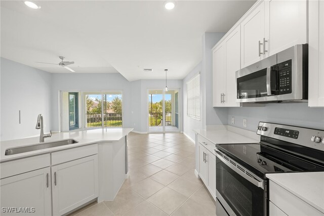 12000 Santaluz Dr Unit 202, Fort Myers, FL 33913 - kitchen with light countertops, recessed lighting, stainless steel appliances, and a sink