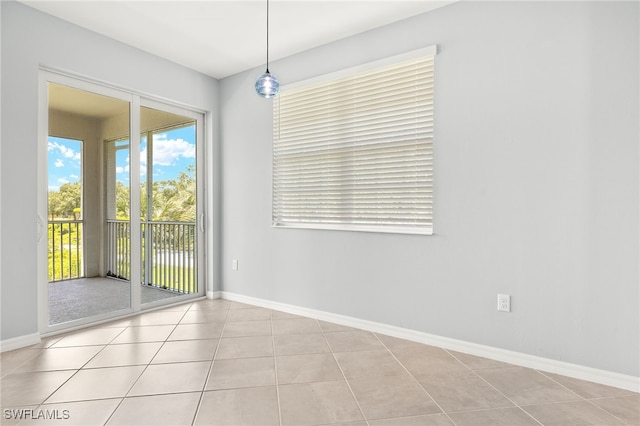 12000 Santaluz Dr Unit 202, Fort Myers, FL 33913 - unfurnished room with baseboards and tile patterned flooring