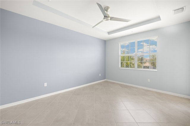 12000 Santaluz Dr Unit 202, Fort Myers, FL 33913 - spare room featuring baseboards, visible vents, a raised ceiling, and ceiling fan
