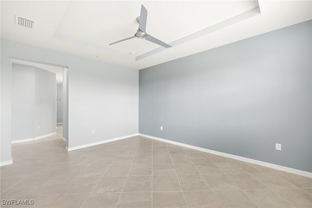 12000 Santaluz Dr Unit 202, Fort Myers, FL 33913 - unfurnished room featuring visible vents, baseboards, a raised ceiling, and ceiling fan