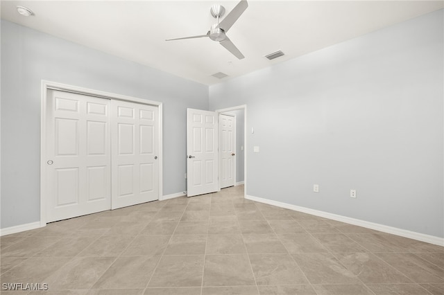 12000 Santaluz Dr Unit 202, Fort Myers, FL 33913 - unfurnished bedroom with ceiling fan, baseboards, visible vents, and a closet