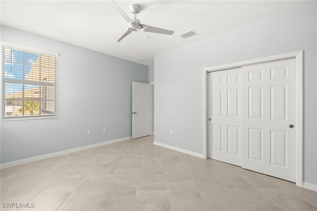 12000 Santaluz Dr Unit 202, Fort Myers, FL 33913 - unfurnished bedroom with a closet, visible vents, baseboards, and ceiling fan