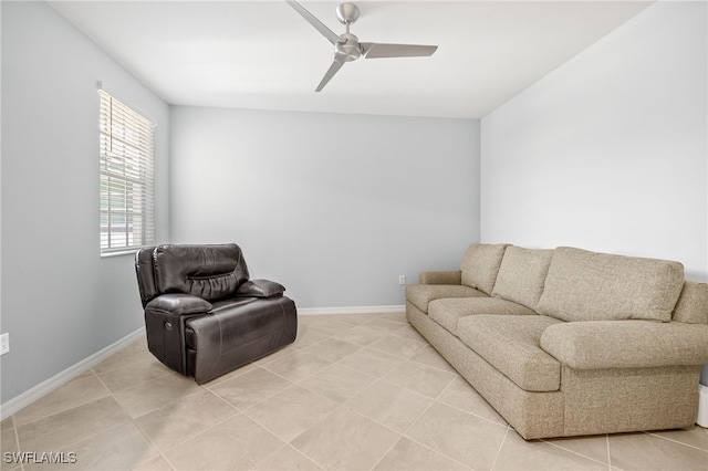 12000 Santaluz Dr Unit 202, Fort Myers, FL 33913 - living room with light tile patterned flooring, a ceiling fan, and baseboards