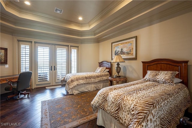 bedroom with crown molding, visible vents, access to exterior, a raised ceiling, and dark wood-style floors