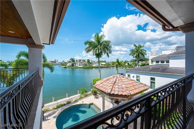 balcony featuring a water view