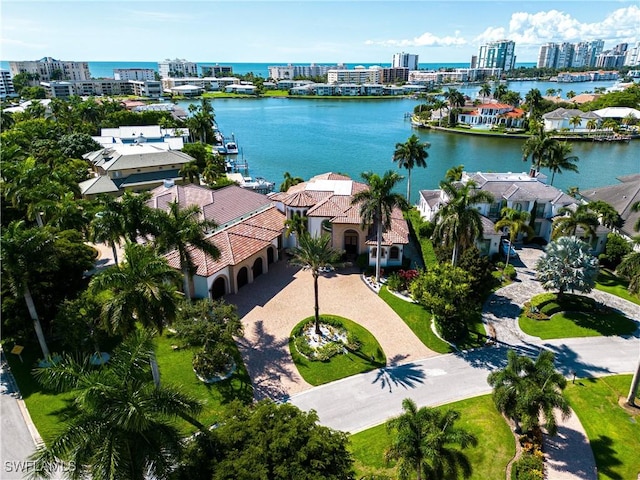 bird's eye view with a water view and a city view
