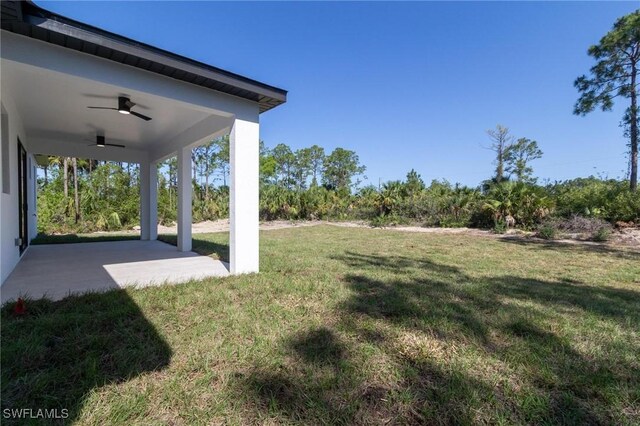 3314 43rd St W, Lehigh Acres, FL 33971 - view of yard featuring a ceiling fan