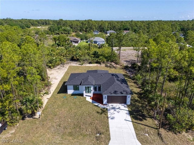 3314 43rd St W, Lehigh Acres, FL 33971 - aerial view with a wooded view