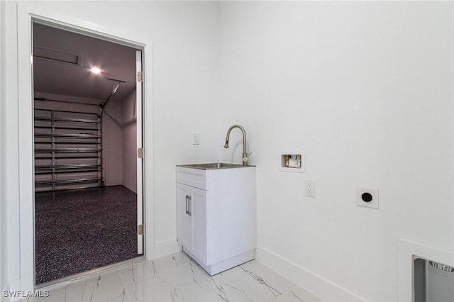 3314 43rd St W, Lehigh Acres, FL 33971 - washroom featuring electric dryer hookup, marble finish floor, washer hookup, a sink, and cabinet space