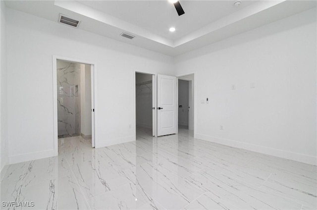 3314 43rd St W, Lehigh Acres, FL 33971 - unfurnished bedroom with a tray ceiling, baseboards, visible vents, and recessed lighting