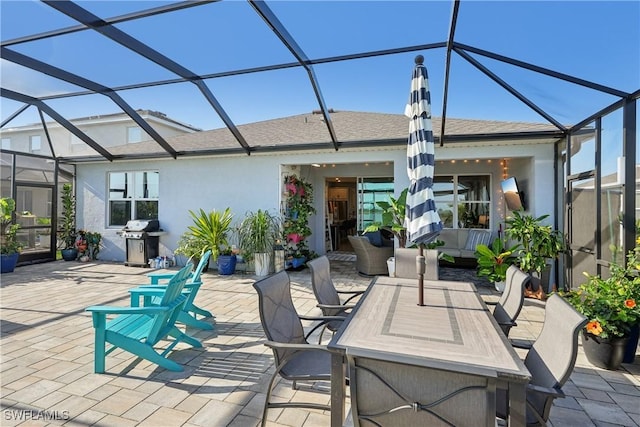 847 Stonewater Lake Ter, Cape Coral, FL 33993 - view of patio / terrace with a grill, glass enclosure, and outdoor dining area