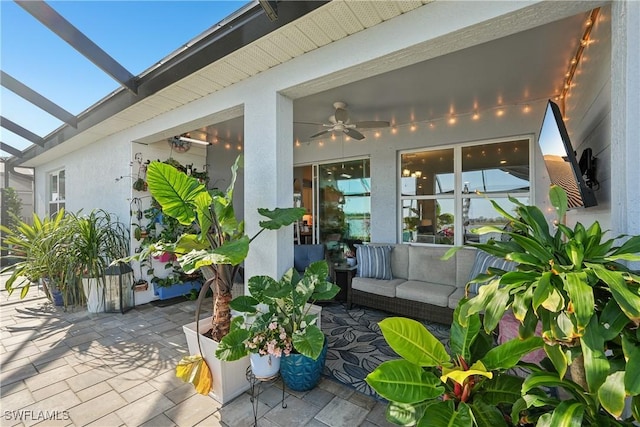 847 Stonewater Lake Ter, Cape Coral, FL 33993 - view of patio with a ceiling fan, outdoor lounge area, and glass enclosure