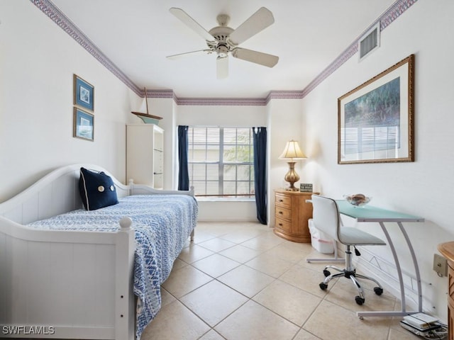 tiled bedroom with visible vents, ornamental molding, and ceiling fan