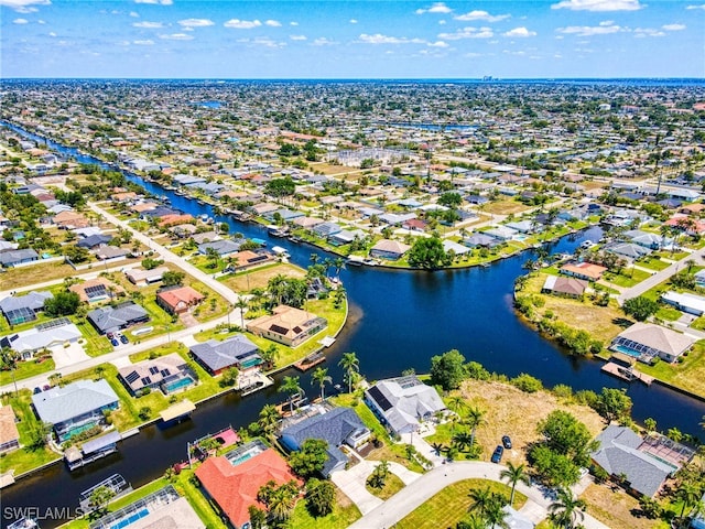 205 SW 42nd Ter, Cape Coral, FL 33914 - aerial perspective of suburban area featuring a large body of water