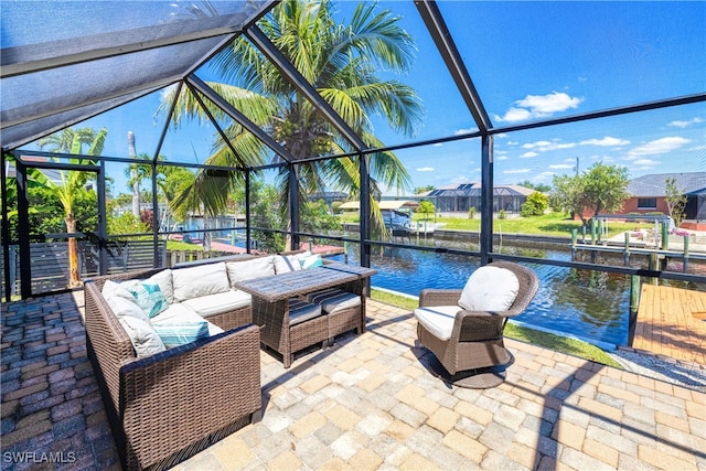205 SW 42nd Ter, Cape Coral, FL 33914 - view of patio / terrace with a water view, an outdoor hangout area, and glass enclosure