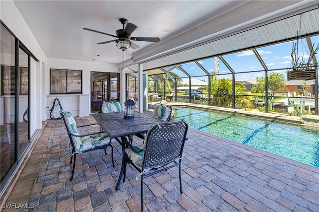 205 SW 42nd Ter, Cape Coral, FL 33914 - outdoor pool featuring a patio area, ceiling fan, and a lanai