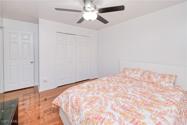 205 SW 42nd Ter, Cape Coral, FL 33914 - bedroom featuring wood finished floors, a closet, and ceiling fan