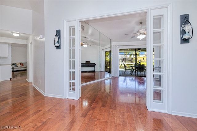 205 SW 42nd Ter, Cape Coral, FL 33914 - hall with wood finished floors and baseboards