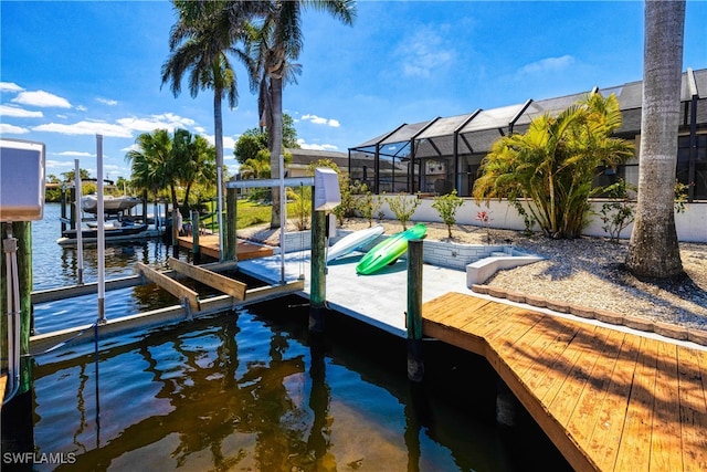 205 SW 42nd Ter, Cape Coral, FL 33914 - dock area featuring boat lift and a water view