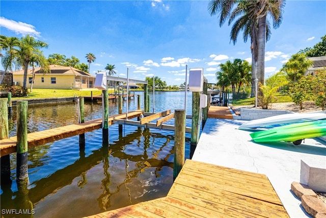 205 SW 42nd Ter, Cape Coral, FL 33914 - dock area featuring boat lift and a water view
