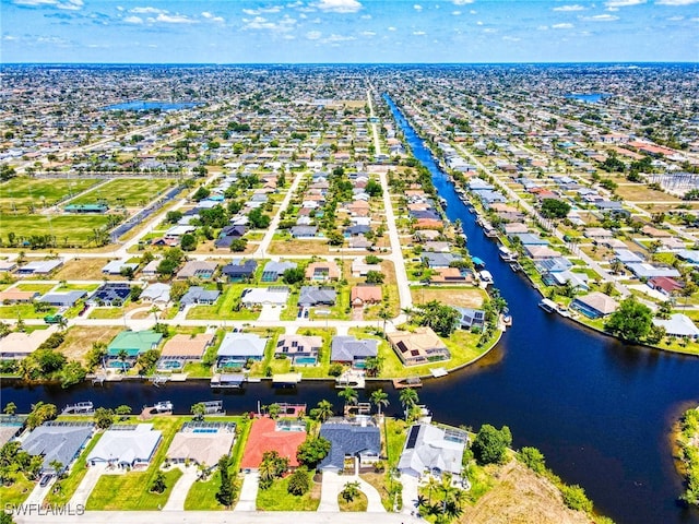205 SW 42nd Ter, Cape Coral, FL 33914 - aerial perspective of suburban area with a nearby body of water