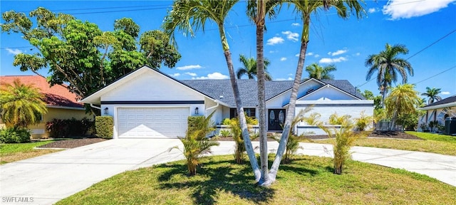205 SW 42nd Ter, Cape Coral, FL 33914 - ranch-style home featuring concrete driveway, a garage, a front lawn, and stucco siding
